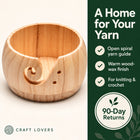 Wood-wax yarn bowl on an ivory background