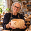 Woman holding a wooden yarn bowl